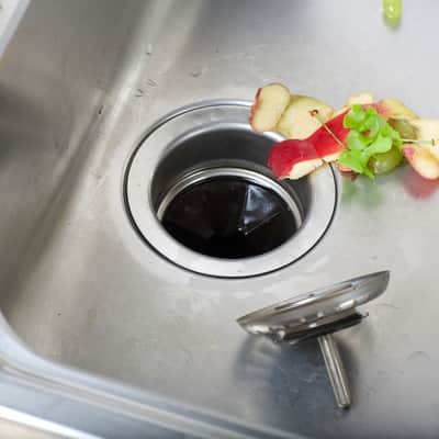 how to clean garbage disposal rubber flange